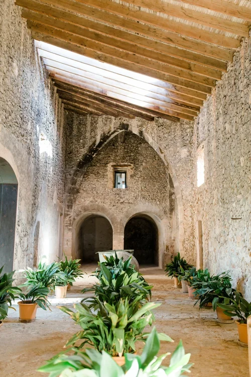 The tafona — the original stone olive press at Finca Es Cabàs, a centuries-old centrepiece of its heritage