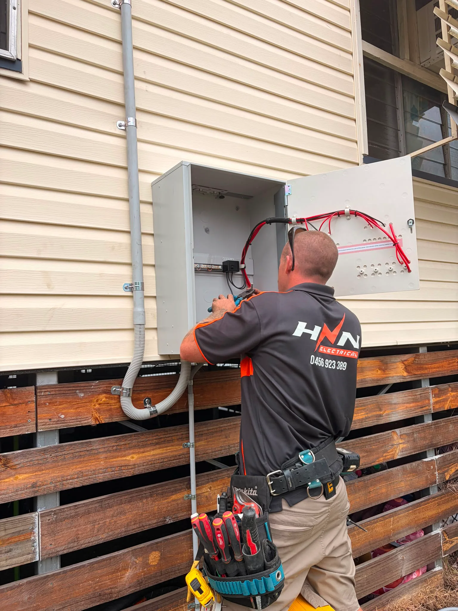 Internal electrical conduit and wiring rough-in during a residential fit-out